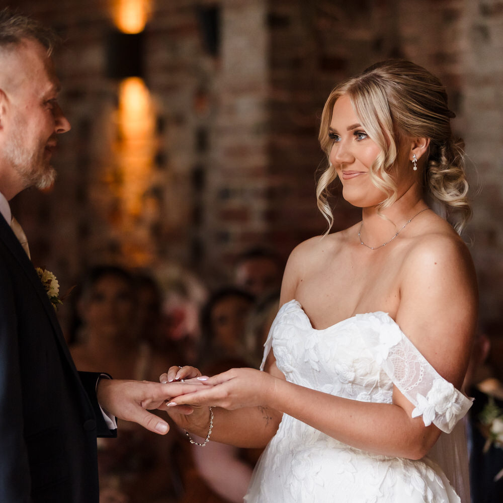 Ring exchange during a ceremony at a Pershore area wedding